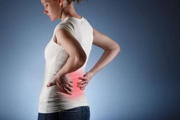Боли в области спины из-за отравления уксусом