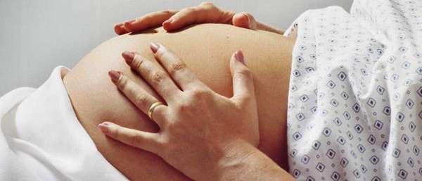 Болит живот в области пупка при беременности